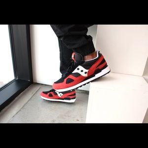 Red, Black, and white saucony shadows